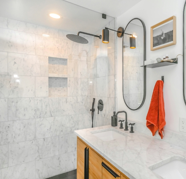 Luxury walk-in shower and single vanity in modern bathroom