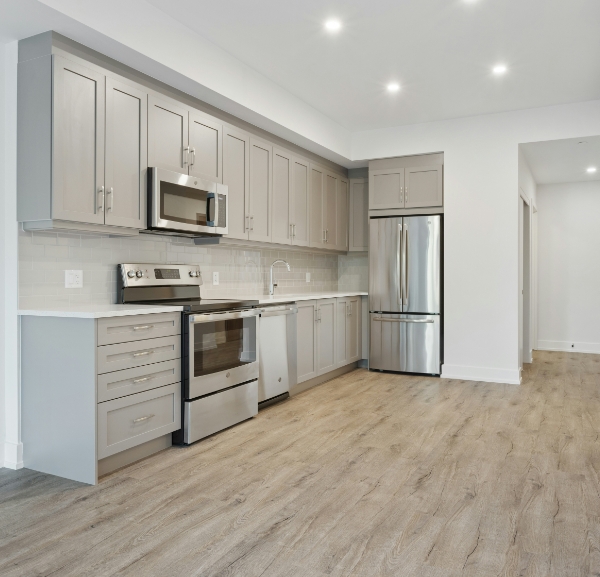 Vinyl plank flooring installed in modern remodeled kitchen